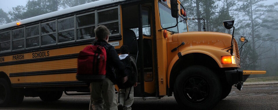 New school year: students getting on bus